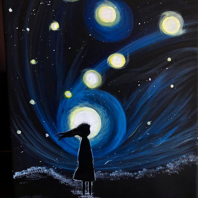 Bambina che guarda galassie e stelle luminose nel cielo notturno
