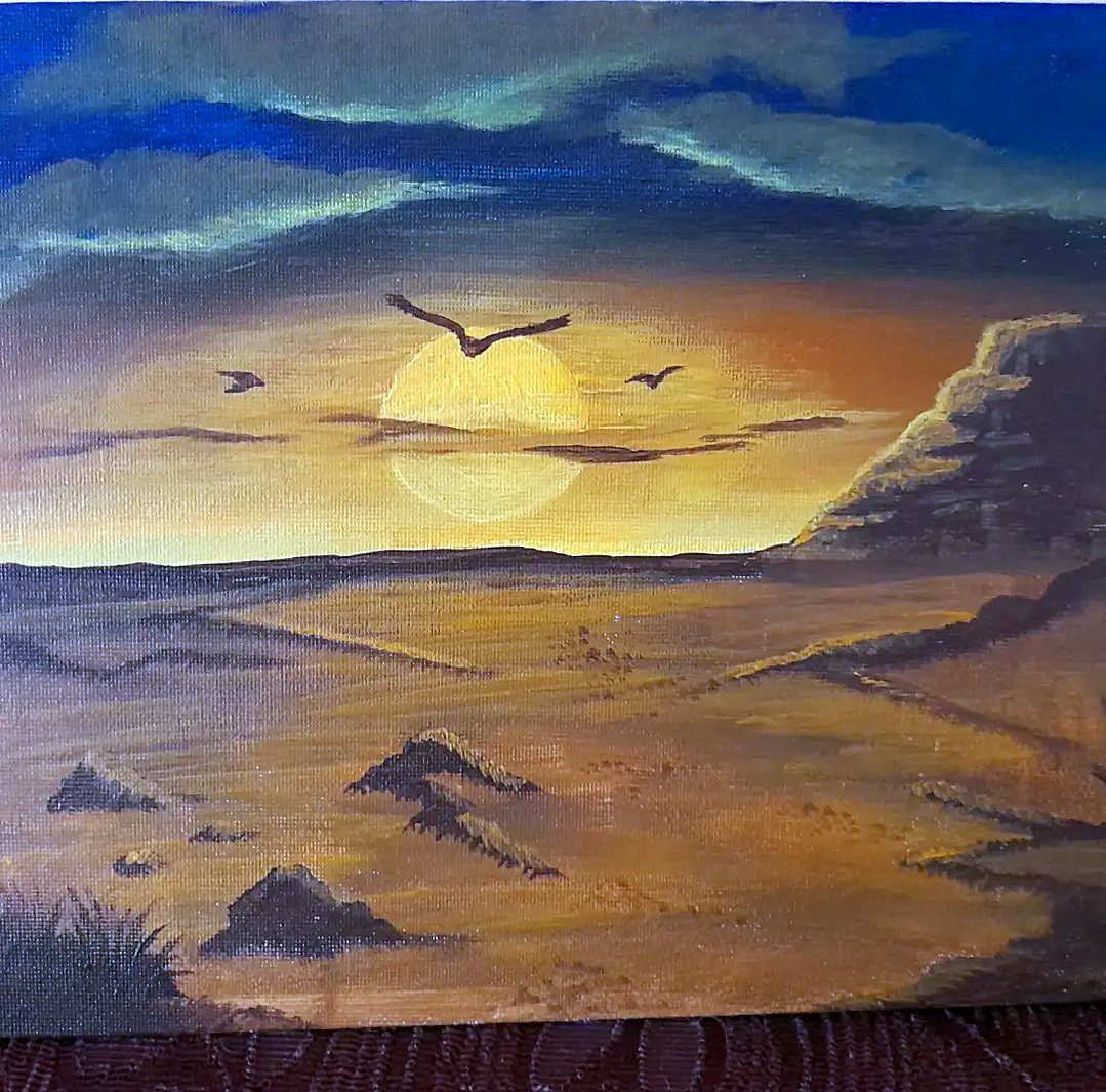 Sole al tramonto su un deserto dorato con uccelli in volo – quadro di Artedory
